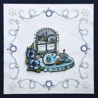 Borduurkaart winter d.blauw/wit, 3 plaatje venster met daarvoor een theetafel